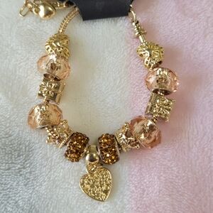 Elegant Gold and Brown Charm Bracelet